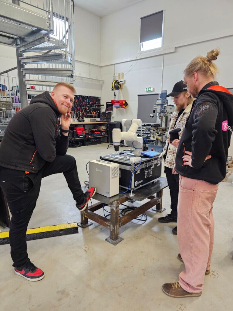 Ville, Risto and Matti exploring the dobot collaborative robot