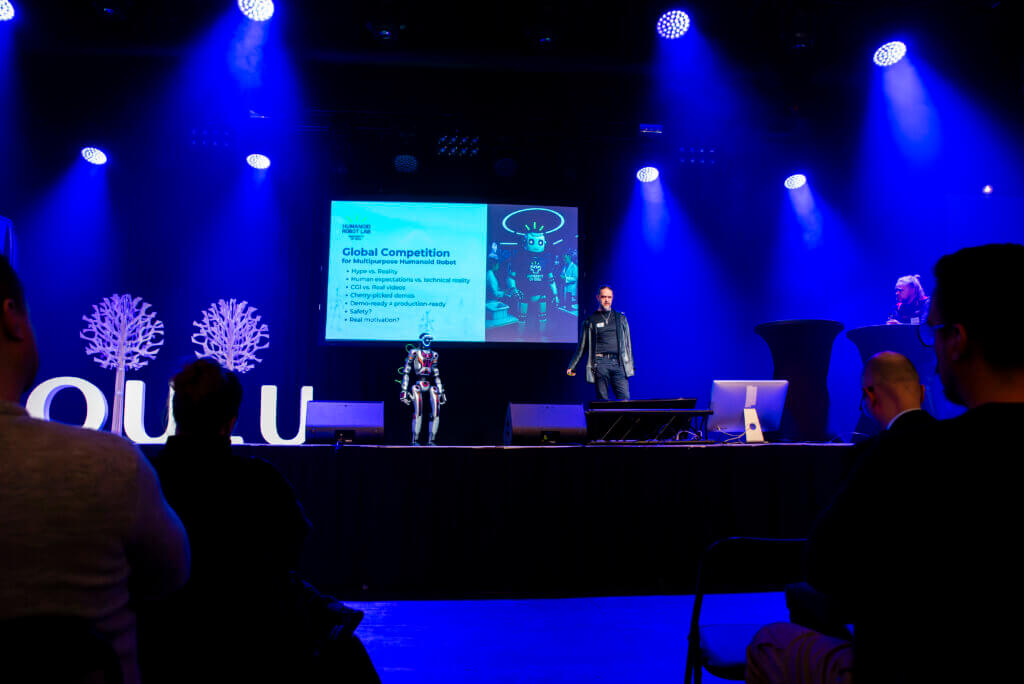Antti Tikanmäki speaking about humanoid robotics at FutureTech in Oulu
